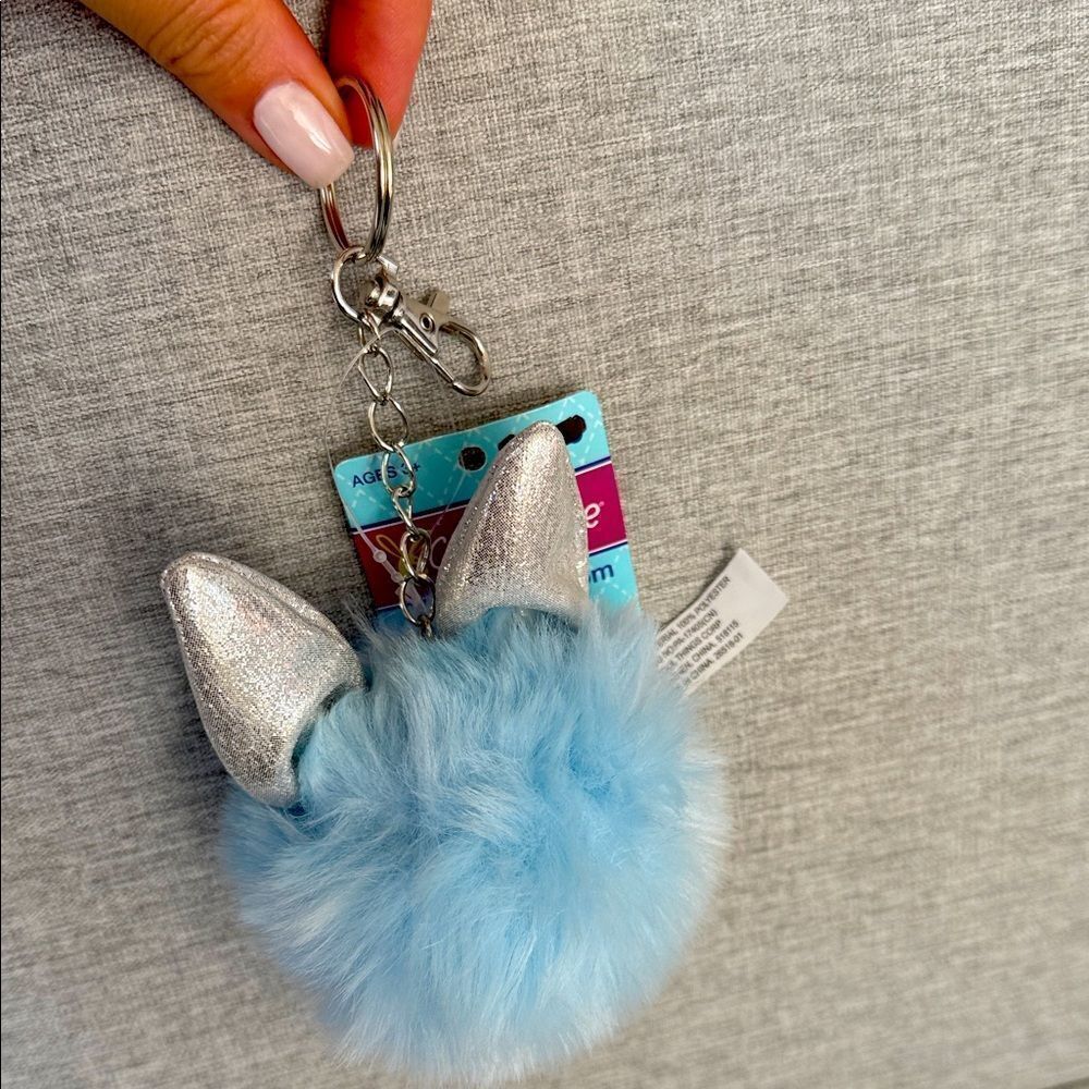 Charming Blue Furry Keychain with Silver Accents